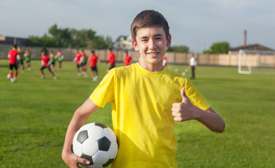 Boy playing football