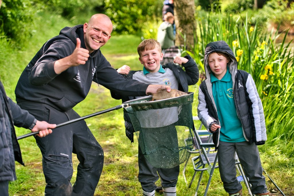 Group of children fishing